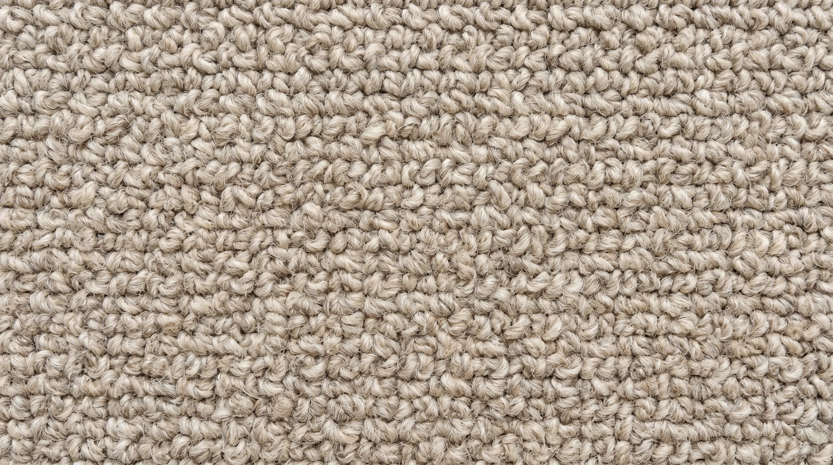 A bouclé wool carpet swatch from a product catalog